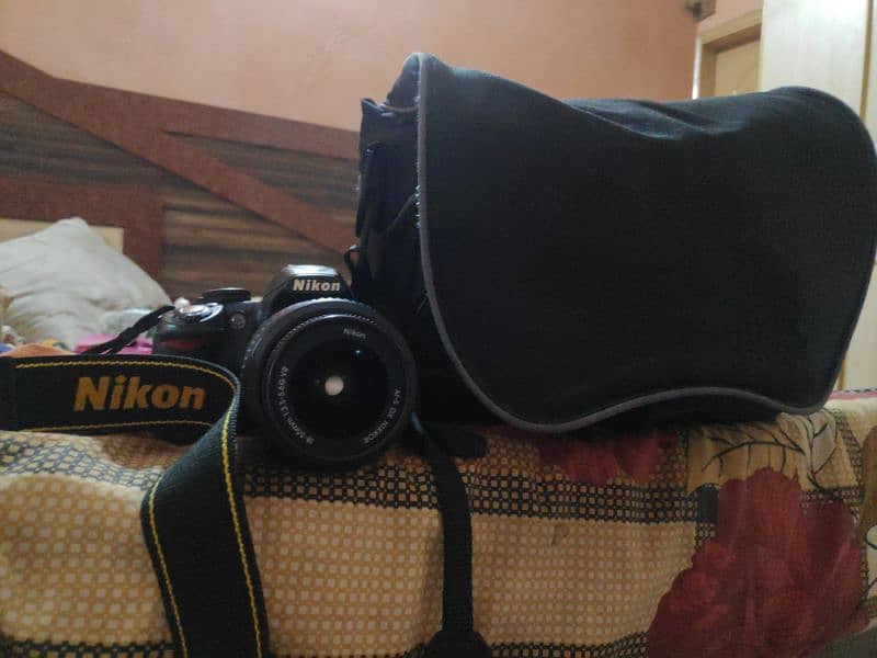 Nikon D3100 with 55-200mm lens and original bag 1