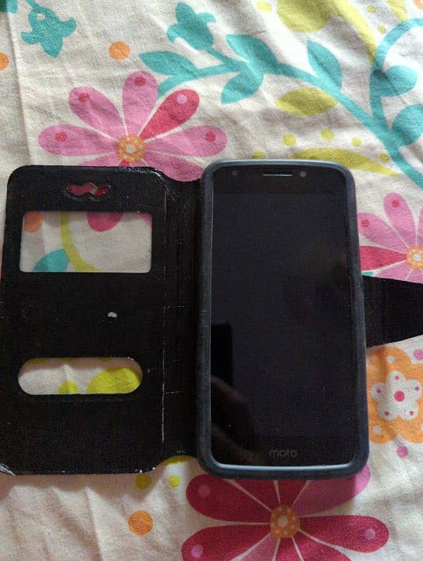 Moto E4 and case included 5