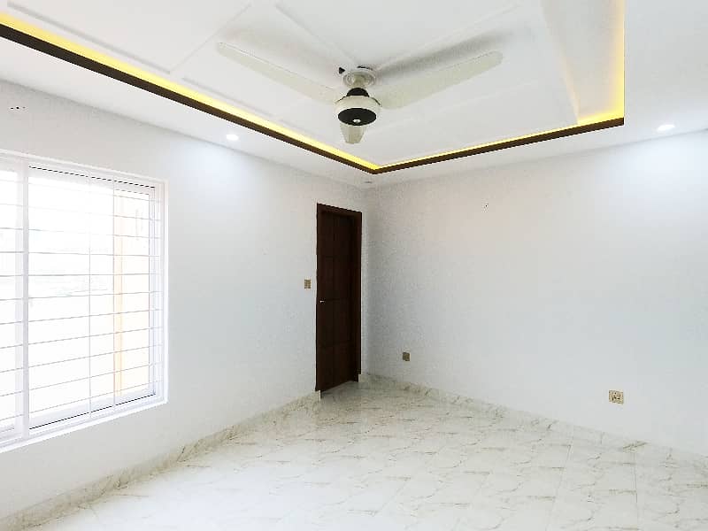 Centrally Located Prime Location House In Eden Boulevard Housing Scheme Is Available For Sale 30