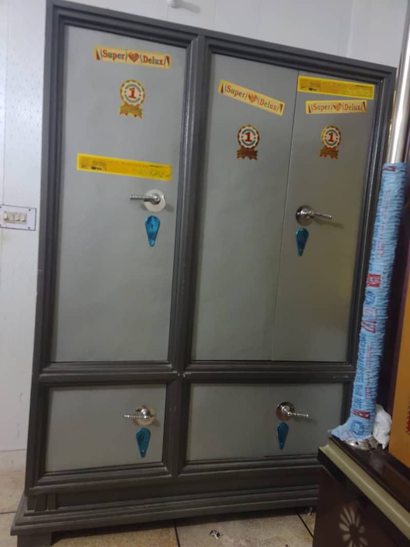 3 Door Iron Safe Almari + 25 Maan Drum For Wheat (Bharola) + Table Fan 1