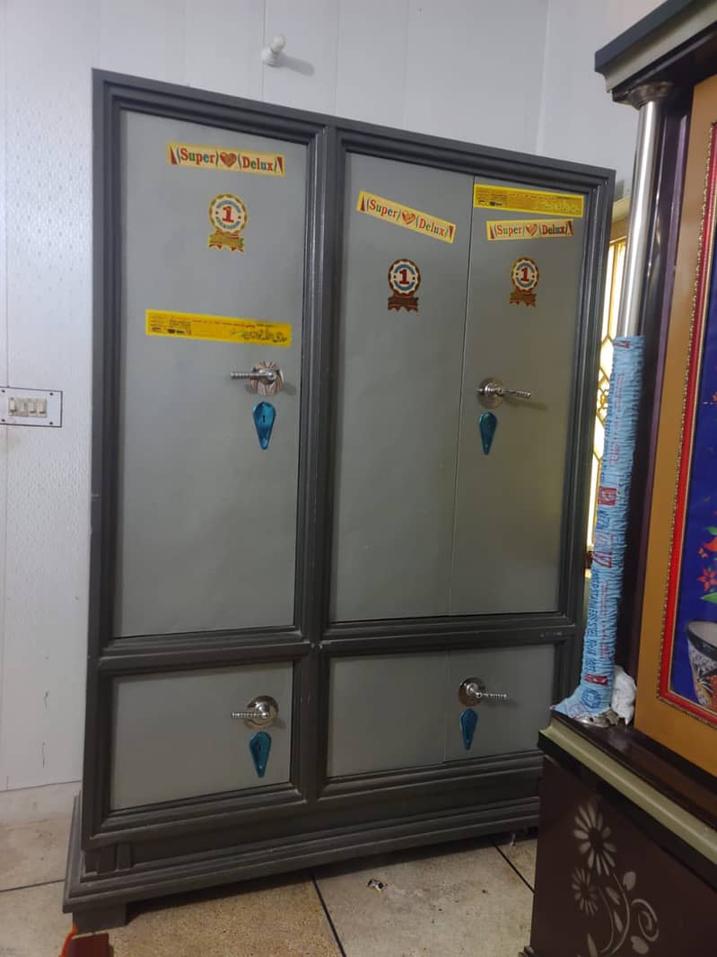 3 Door Iron Safe Almari + 25 Maan Drum For Wheat (Bharola) + Table Fan 2