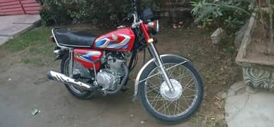 Honda 125 red colour 10/10 condition