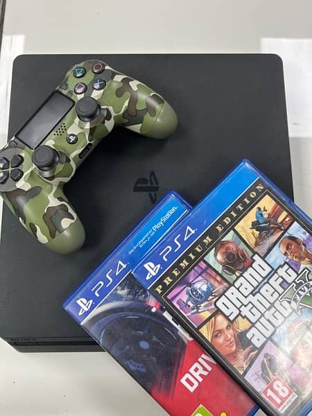 PS4 Slim 1TB with 2 Games 9