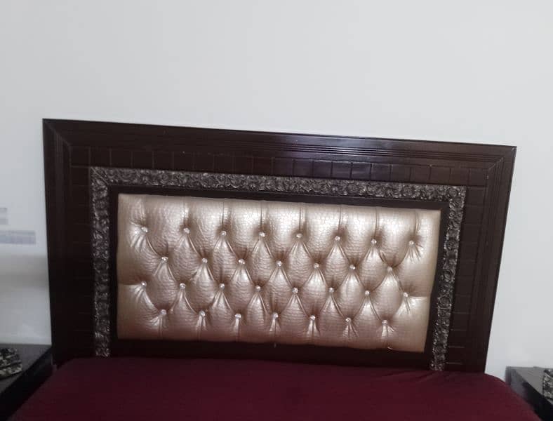 wooden bed with leather  back 3