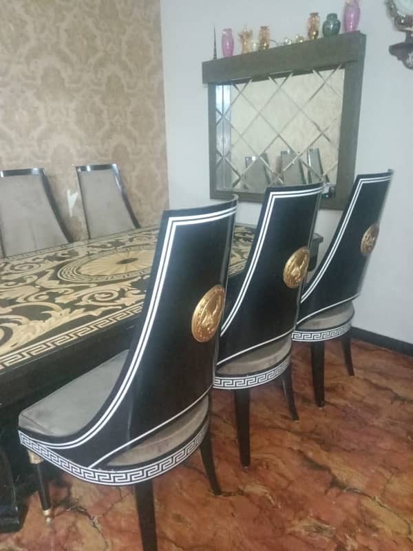 one year used luxury dining table with 8 chairs 10/10 condition 0