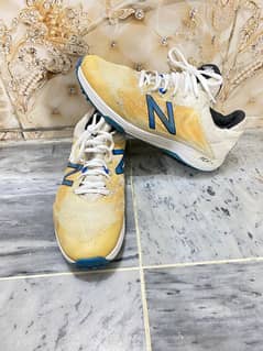 New balance bowling spikes