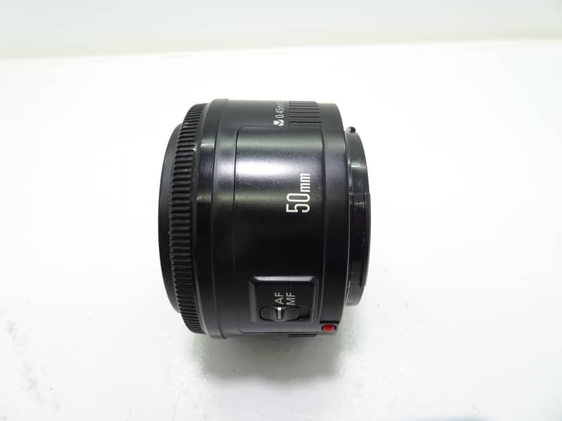 Canon EF 50mm f/1.8 STM Standard Prime Lens with both capes. 3