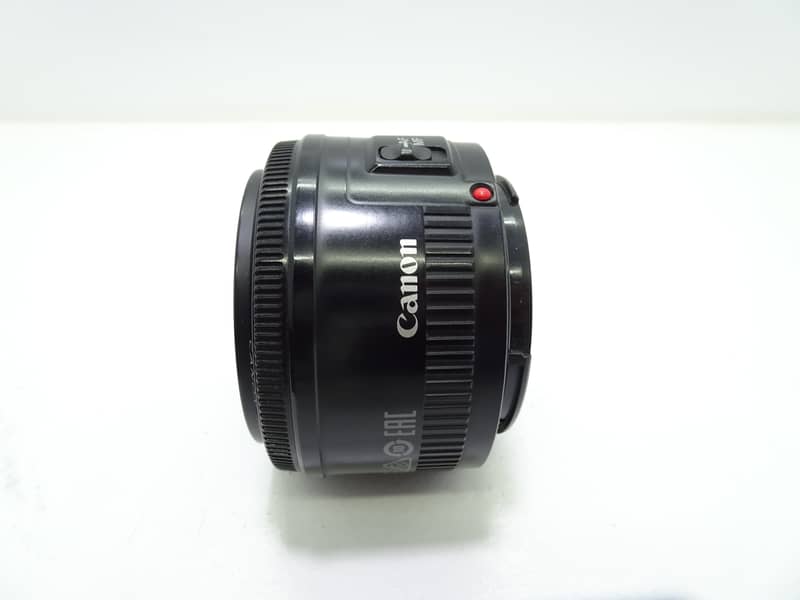 Canon EF 50mm f/1.8 STM Standard Prime Lens with both capes. 4