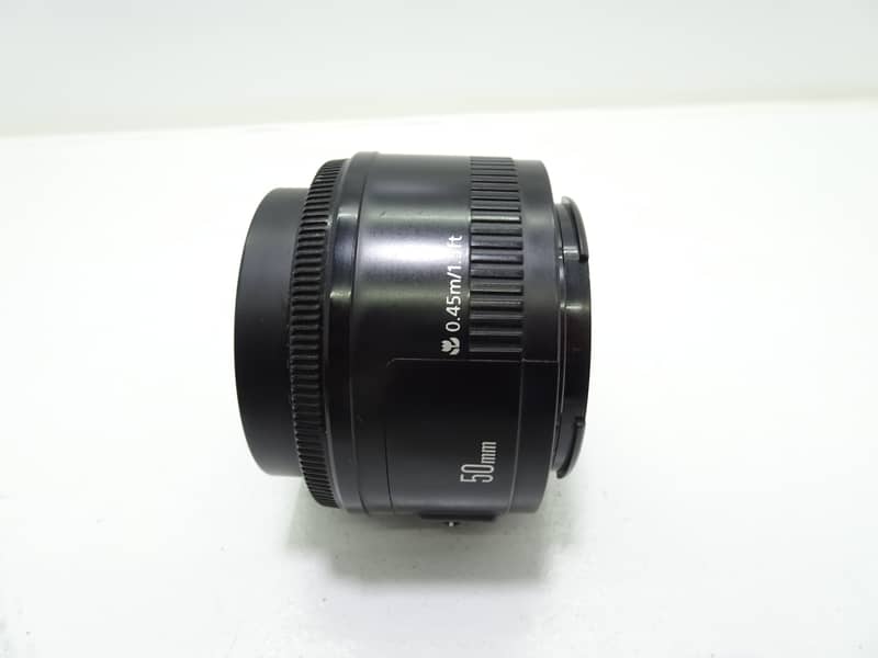 Canon EF 50mm f/1.8 STM Standard Prime Lens with both capes. 5