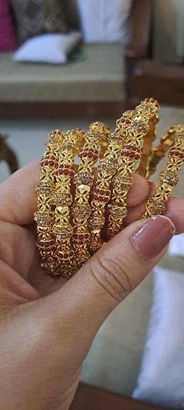 6 golden bangles 0