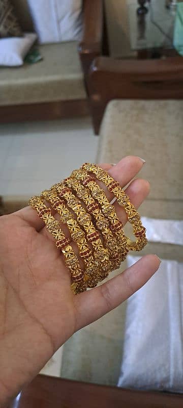 6 golden bangles 1