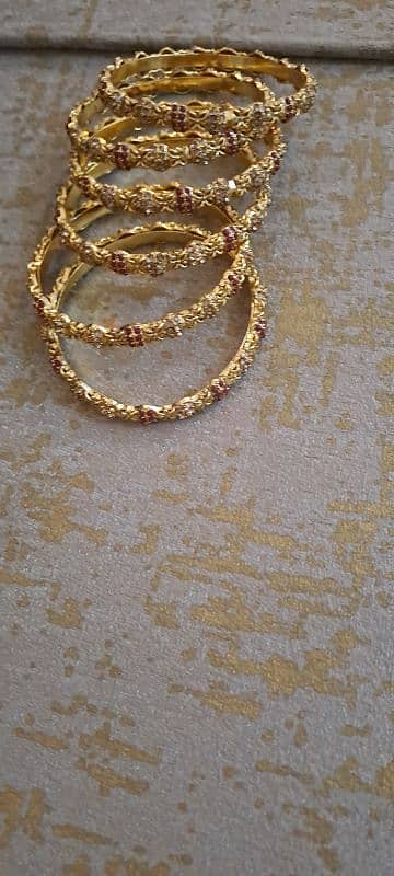 6 golden bangles 3