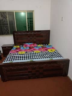 Bed with mattress and two side table