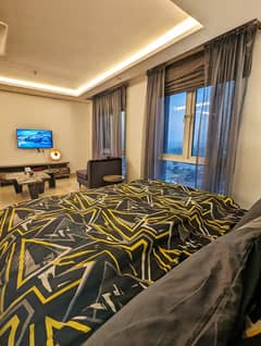 luxury stay Fully Furnished studio room Luxury Apartment For Rent