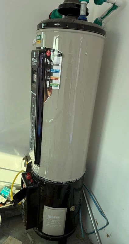 electric/gas geyser for sale (35 Gallon-used like new] 1