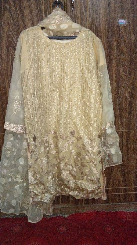 3 pc sitara and tilla with thread embellished organza suits gold color 1