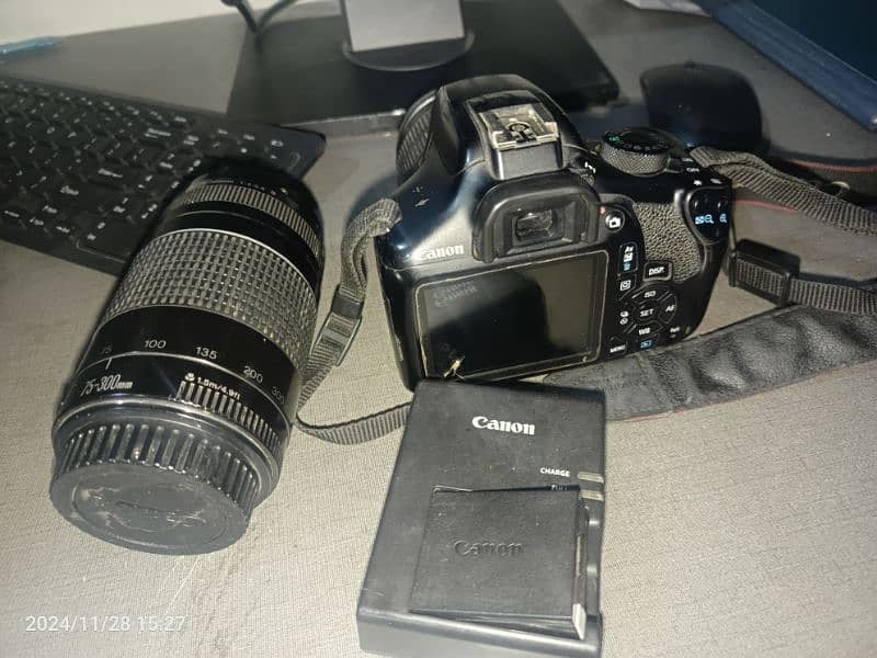 Canon 1300D with lens 75-300 and 18-55 2