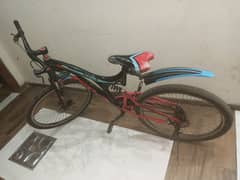 cycle Almost new 10/10 condition with shocks and disk breaks