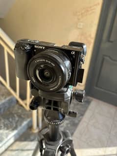 Sony A6000 with Kit lens (Dummy battery and 64GB card for free)