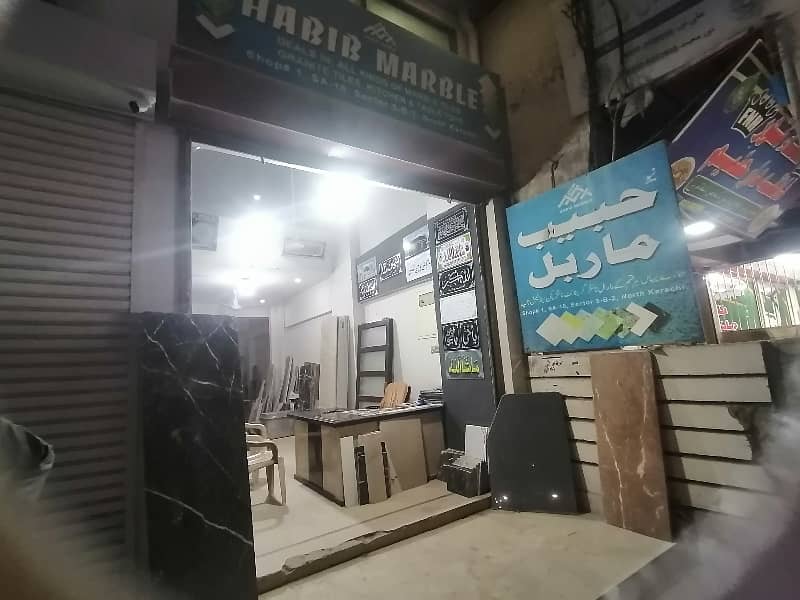 SHOP For rent 320 feet main road facing 1250 hight 24 feet with attached bath Behind zahid sweets 1