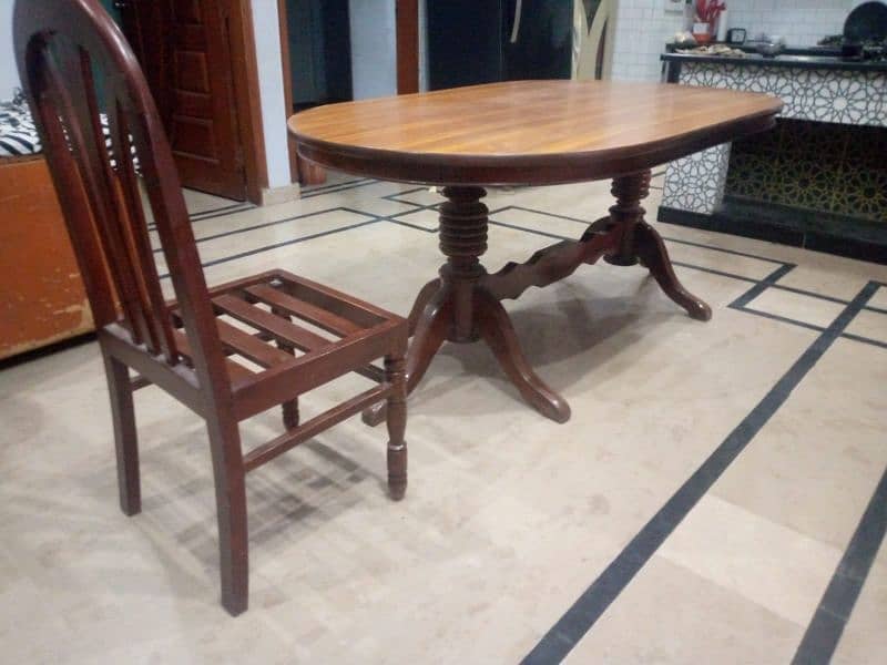 Dining table with 6 chairs without cushions 4