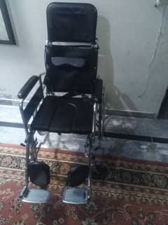 wheel chair kamode wali slightly used