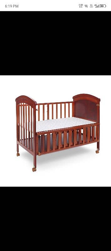 tinnies wooden cot slightly used 9/10 condition 0