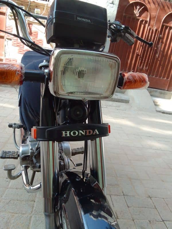 HONDA 70 NEW CONDITION 4