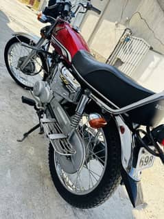 Islamabad number Honda 125 2022 model in red colour for sale