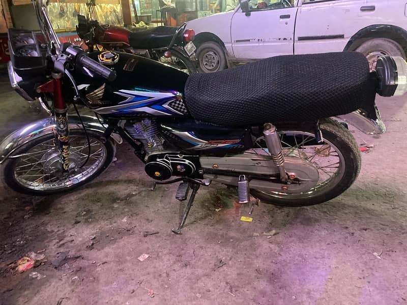 Honda cg 125 2014 model ha 16 ka number lga huwa ha 1