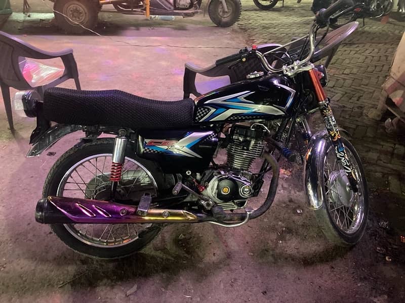 Honda cg 125 2014 model ha 16 ka number lga huwa ha 2