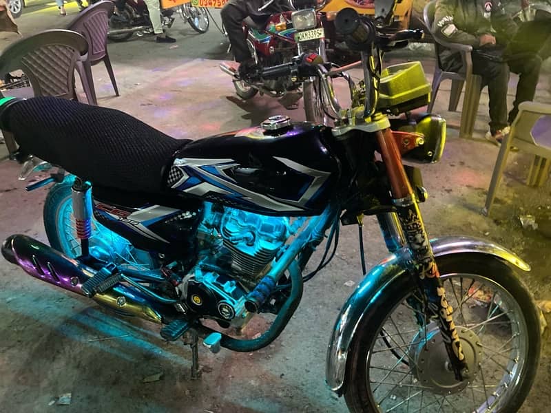 Honda cg 125 2014 model ha 16 ka number lga huwa ha 7