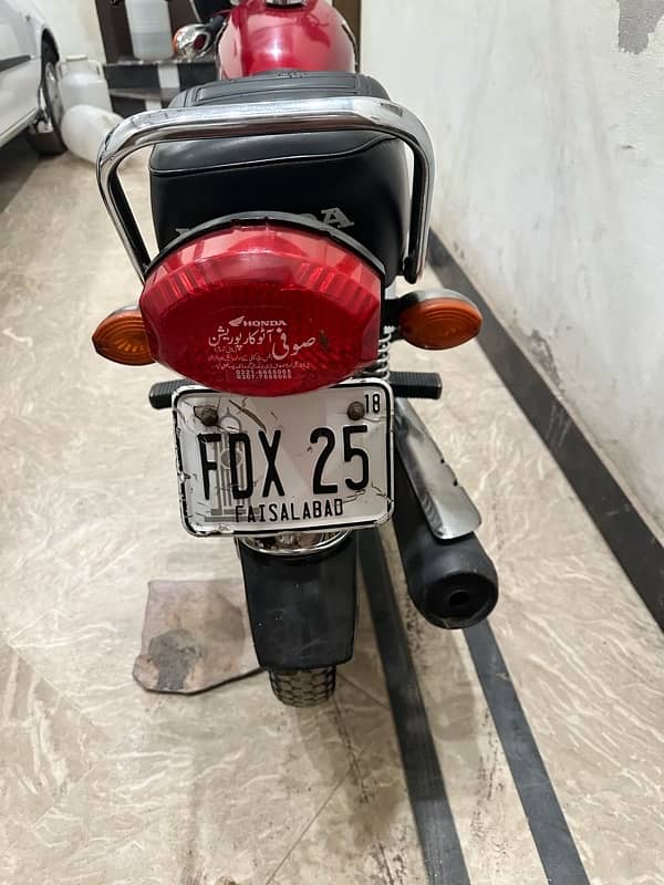 Honda 125 18 model with Golden Number plate 0