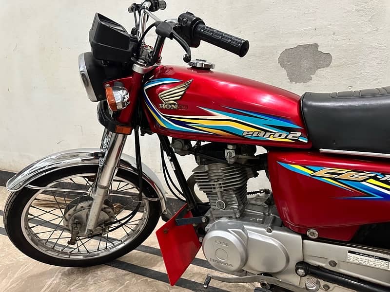 Honda 125 18 model with Golden Number plate 3