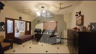 240 Yard modern double storey bungalow for sale in Gulshan-e-Iqbal, Block 1 Double Story Bungalow: Elegant and modern design.