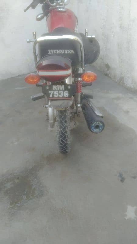 honda  125 bike ha urgent sale karna ha WhatsApp number 03199217467 1