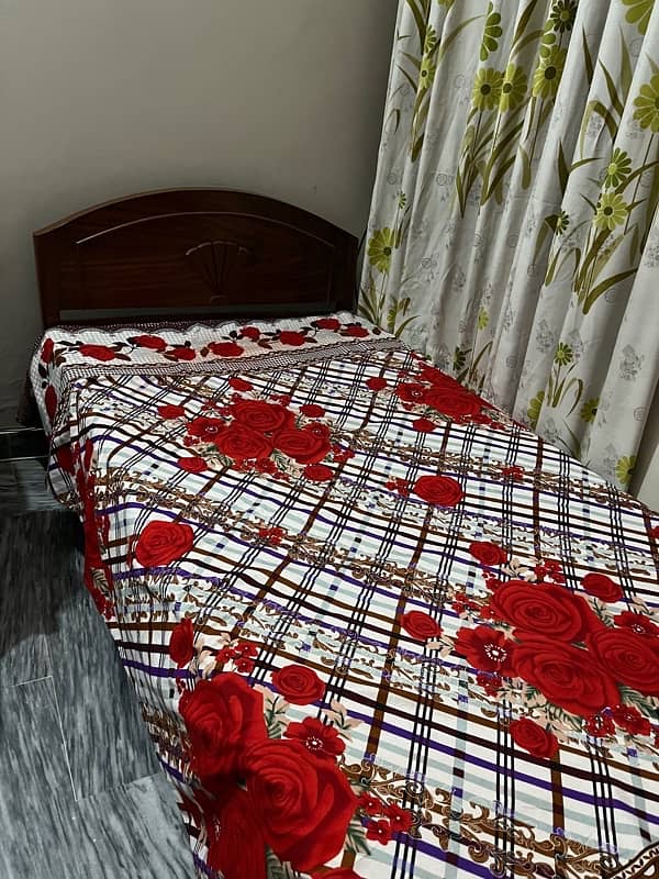 Wooden single bed with mattress 0