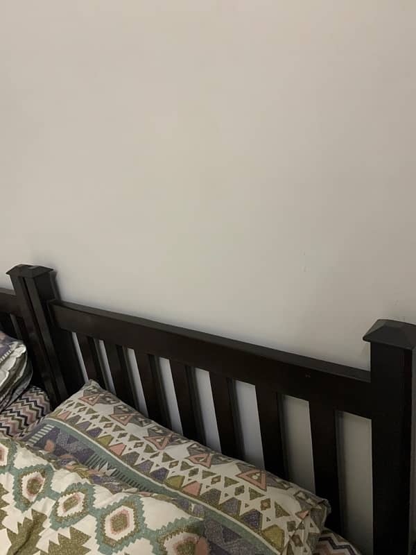 wooden single bed set in very good condition with mattress 1