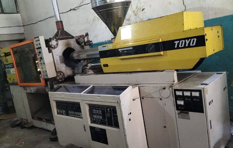 Injection molding machine Toyo 180 1