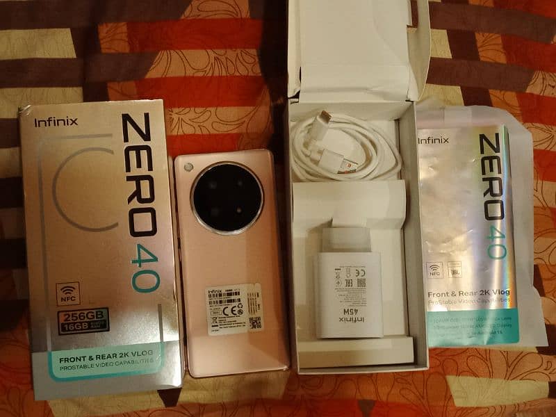 infinix zero 40 11 months + warranty 10/10 condition with box charger 1