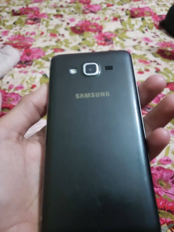 Samsung grand prime plus all ok back button no work pta approved 8gb 4