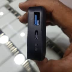 Universal pd multiport travel adopter with power bank