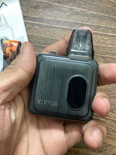 Xlim SQ Pro with Box (GUNMETAL WOOD) with 25mg(BLUEBERRY LEMON) juice.