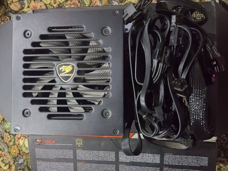 Cougar 750 WATTS GOLD Power Supply read ad 10