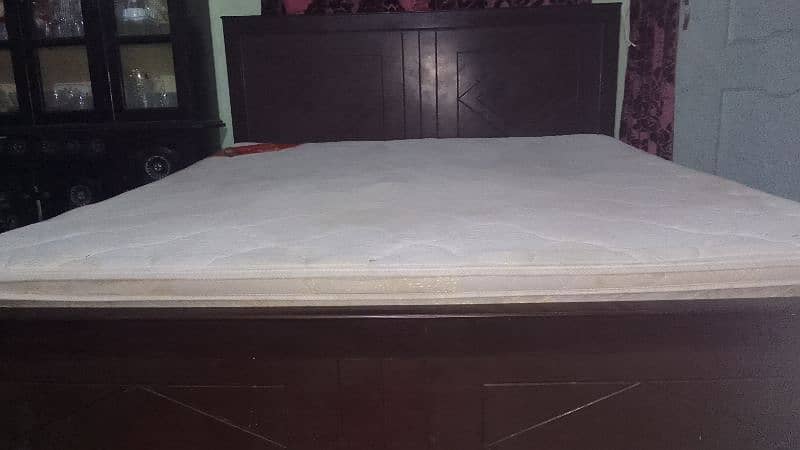 double bed with mattress and side tables 0