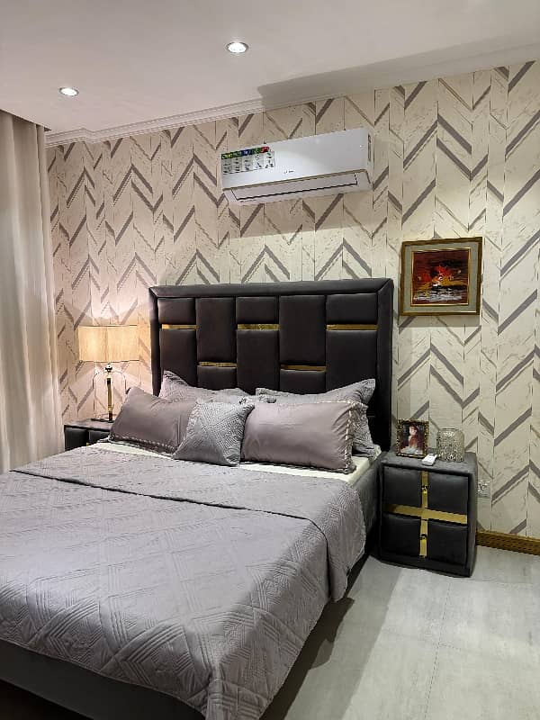 A BEAUTIFUL LIKE NEW FULLY LAUXR FURNISHED APARTMENT FOR RENT IN SECTOR C BAHRIA TWON LAHORE 6