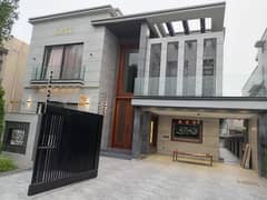 One Kanal Ultra Luxury Modern Double Height Lobby Semi Furnished House With Eight Inverter AC, Two Door Inverter Refrigerator And MWO Installed At Prime Location Of Jasmine Block Secter C Bahria Town Lahore