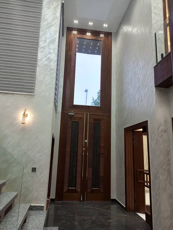 One Kanal Ultra Luxury Modern Double Height Lobby Semi Furnished House With Eight Inverter AC, Two Door Inverter Refrigerator And MWO Installed At Prime Location Of Jasmine Block Secter C Bahria Town Lahore 5