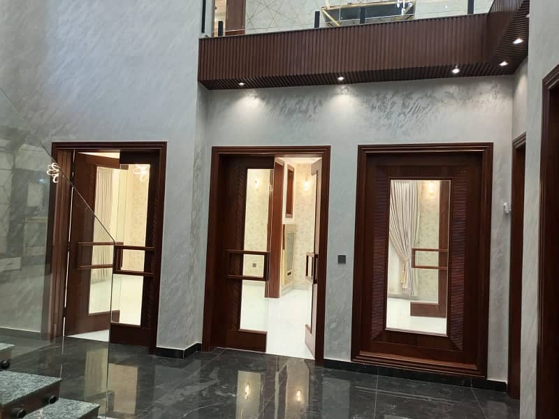 One Kanal Ultra Luxury Modern Double Height Lobby Semi Furnished House With Eight Inverter AC, Two Door Inverter Refrigerator And MWO Installed At Prime Location Of Jasmine Block Secter C Bahria Town Lahore 14