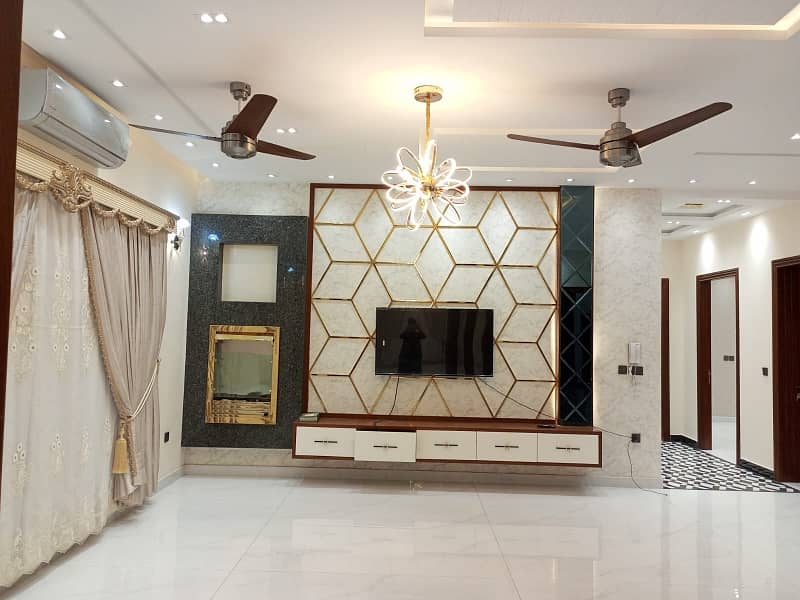 One Kanal Ultra Luxury Modern Double Height Lobby Semi Furnished House With Eight Inverter AC, Two Door Inverter Refrigerator And MWO Installed At Prime Location Of Jasmine Block Secter C Bahria Town Lahore 19